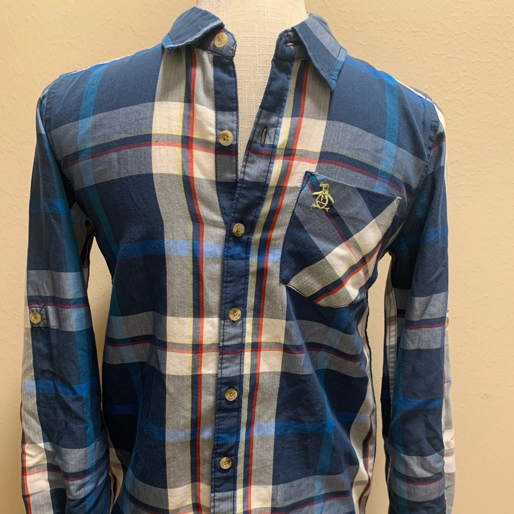 An original Penguin button down shirt. Youth Size Medium